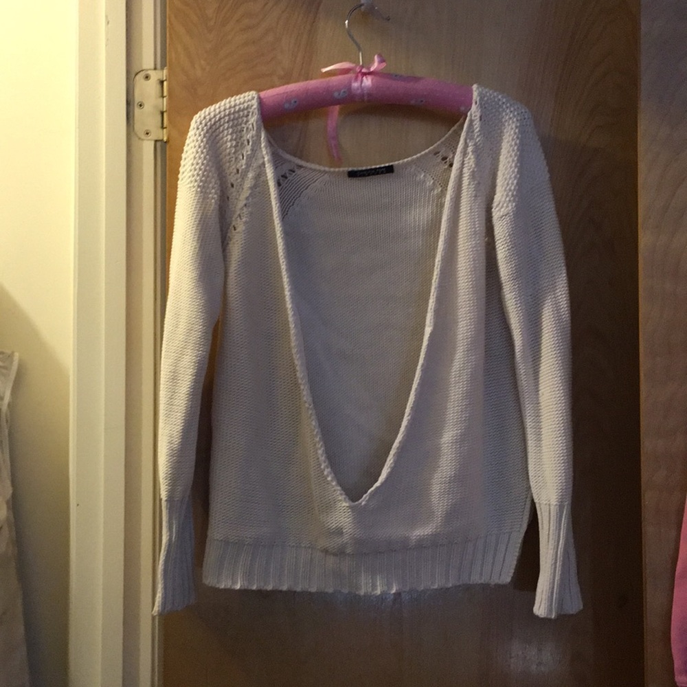 Cream colored designer DEEP V neck sweater